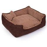 Brun sofa med pute til kjæledyr