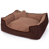 Brun sofa med pute til kjæledyr